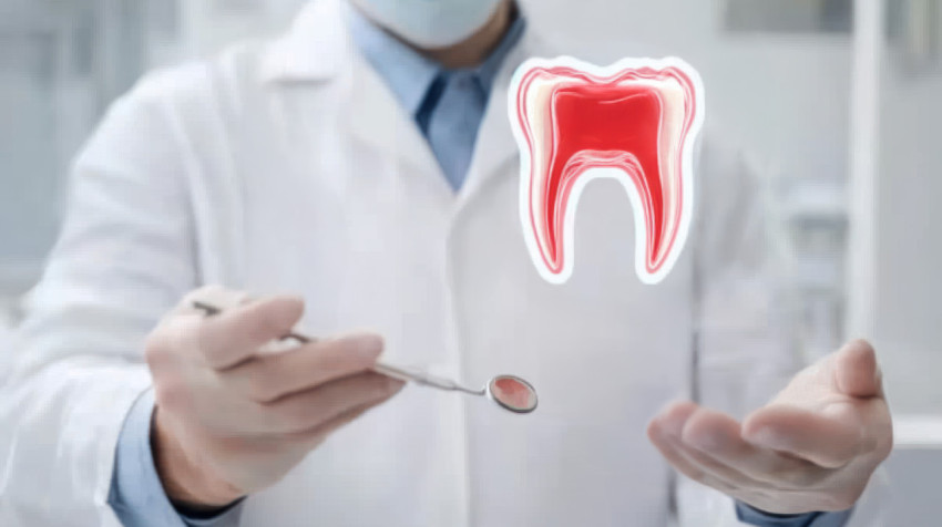 Dental doctor holds virtual dental tools in front with a red tooth hologram floating above Dental doctor holds virtual dental tools in front with a red tooth hologram floating above