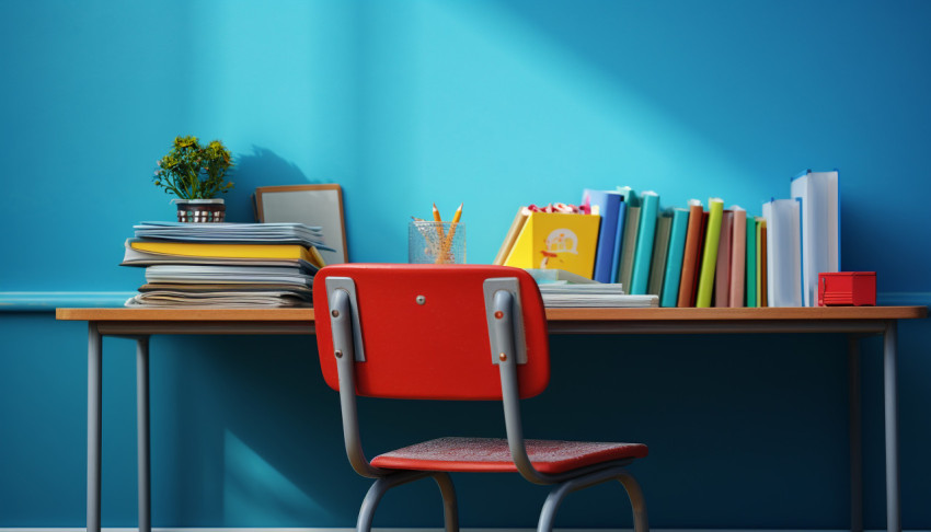 School Supplies and Textbooks on a Blue Desk School Supplies and Textbooks on a Blue Desk