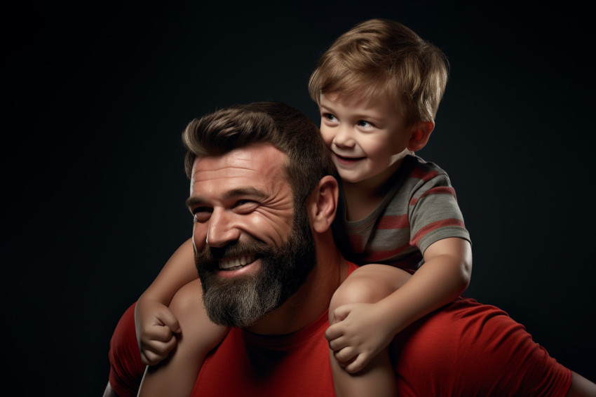 A photo of a young boy sitting on his fathers shoulders flexing A photo of a young boy sitting on his fathers shoulders flexing