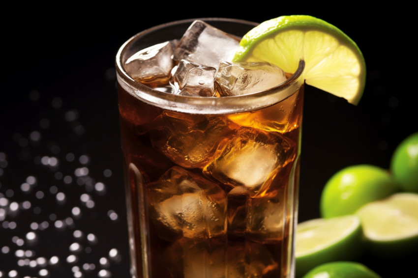 Picture of a cuba libre drink with lime and ice Picture of a cuba libre drink with lime and ice