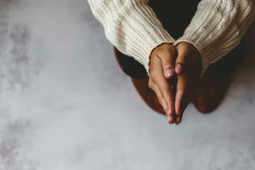Woman in crisis prays for god blessing seeking a better life Woman in crisis prays for god blessing seeking a better life