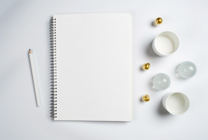 A white notebook with some graphs on the white background top view stock photo, seo stock images for marketing campaigns Get unlimited access to a library of free ai prompts and ai images to help you generate creative ideas.