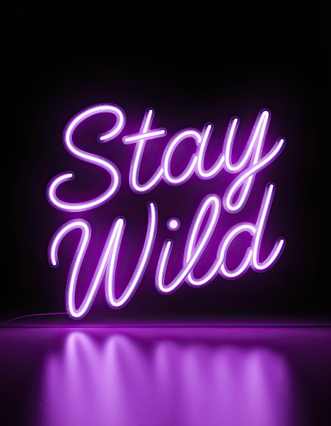 Neon glow typography "Stay Wild" in purple grunge cursive style Neon glow typography "Stay Wild" in purple grunge cursive style