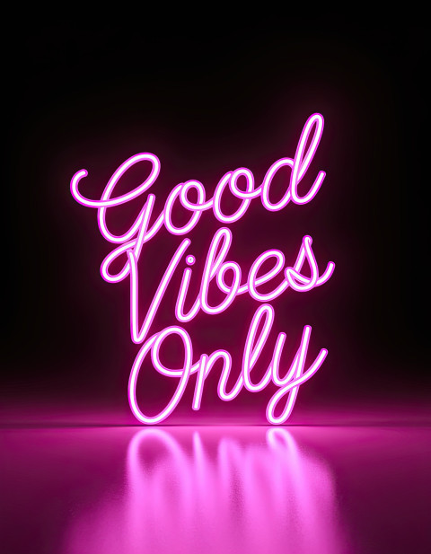 Neon glow typography "Good Vibes Only" in pink neon on matte black Neon glow typography "Good Vibes Only" in pink neon on matte black