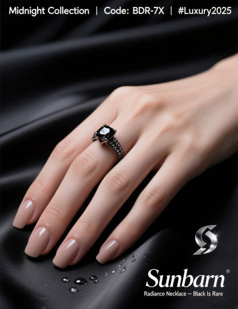 Black diamond ring on graceful hand with nude nails posed on satin fabric under spotlight Black diamond ring on graceful hand with nude nails posed on satin fabric under spotlight
