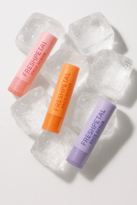 Face primer tube floating above water ripples Face primer tube floating above water ripples