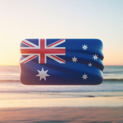 Australian flag icon with soft waves floating gently over a golden beach sunset background Australian flag icon with soft waves floating gently over a golden beach sunset background