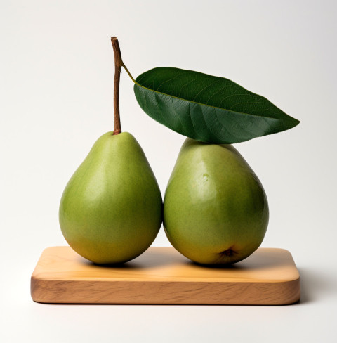 Two avocados on a wooden board on white background Two avocados on a wooden board on white background, avocado image stock photo