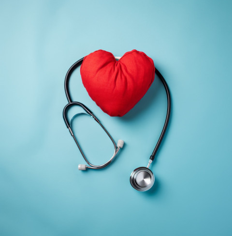 Heart and stethoscope on blue background Heart and stethoscope on blue background, medical images stock